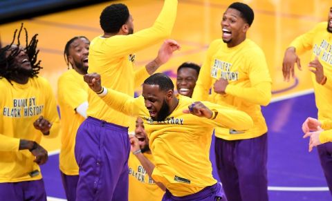 LA Lakers players celebrating after winning the league.